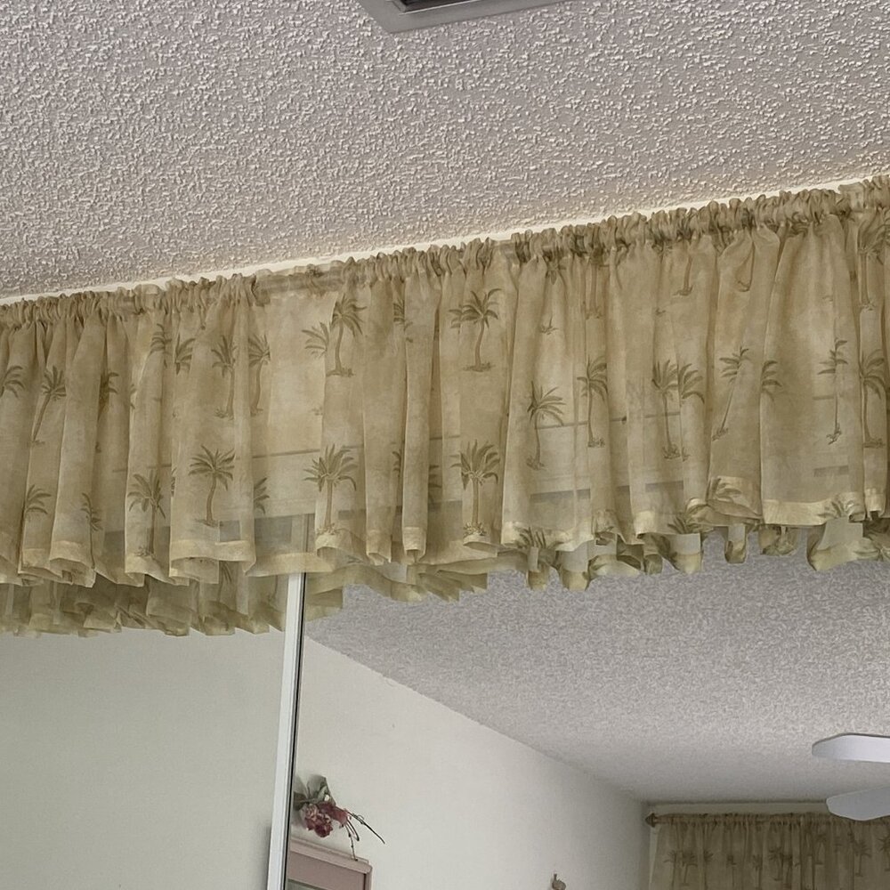 Elegant Curtain Valance with Gold Colored Rod